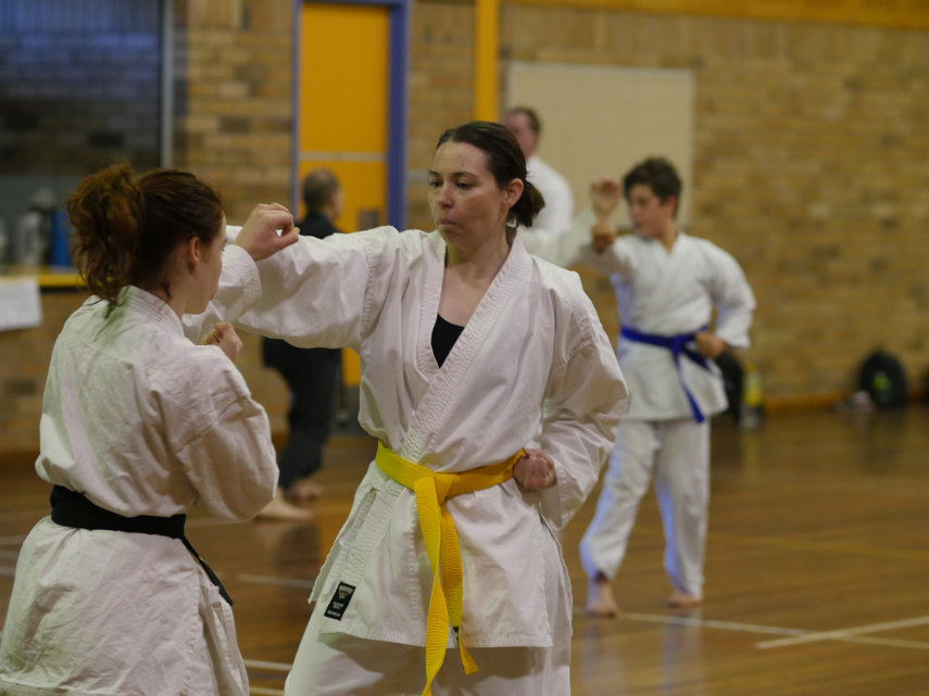 Yellow belt sparring at martial arts grading