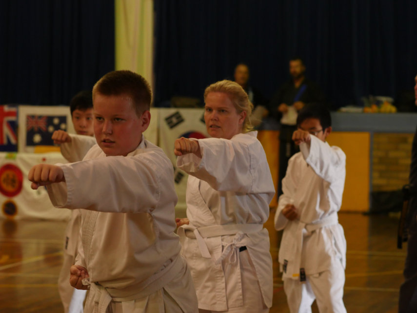 White belts practicing their patterns